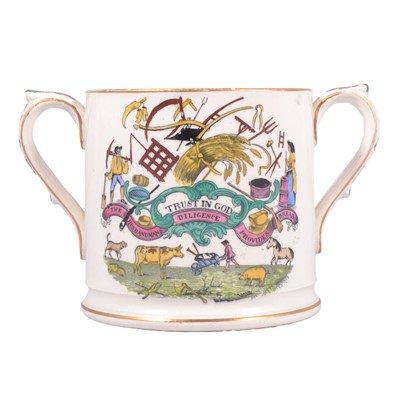 Lot 29 - A 19th century Staffordshire farming related twin handled mug "Industry Produceth Wealth"