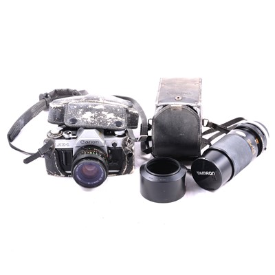 Lot 195 - Canon AE1 camera body, 50mm, with extension and additional lens