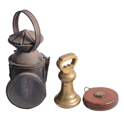 Lot 162 - A railway lamp, brass 7lb. weight and a Chesterman leather covered reel.