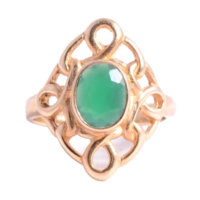 Lot 4 - A 9 carat yellow gold dress ring with green stone.