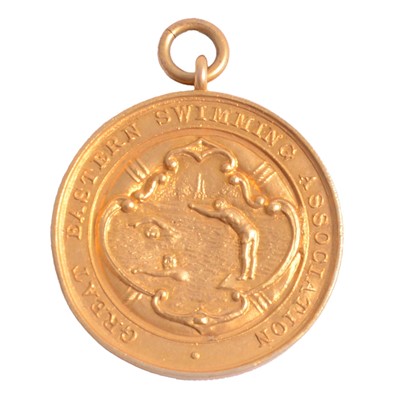 Lot 142 - A 15 carat yellow gold Great Eastern Swimming Association medal.