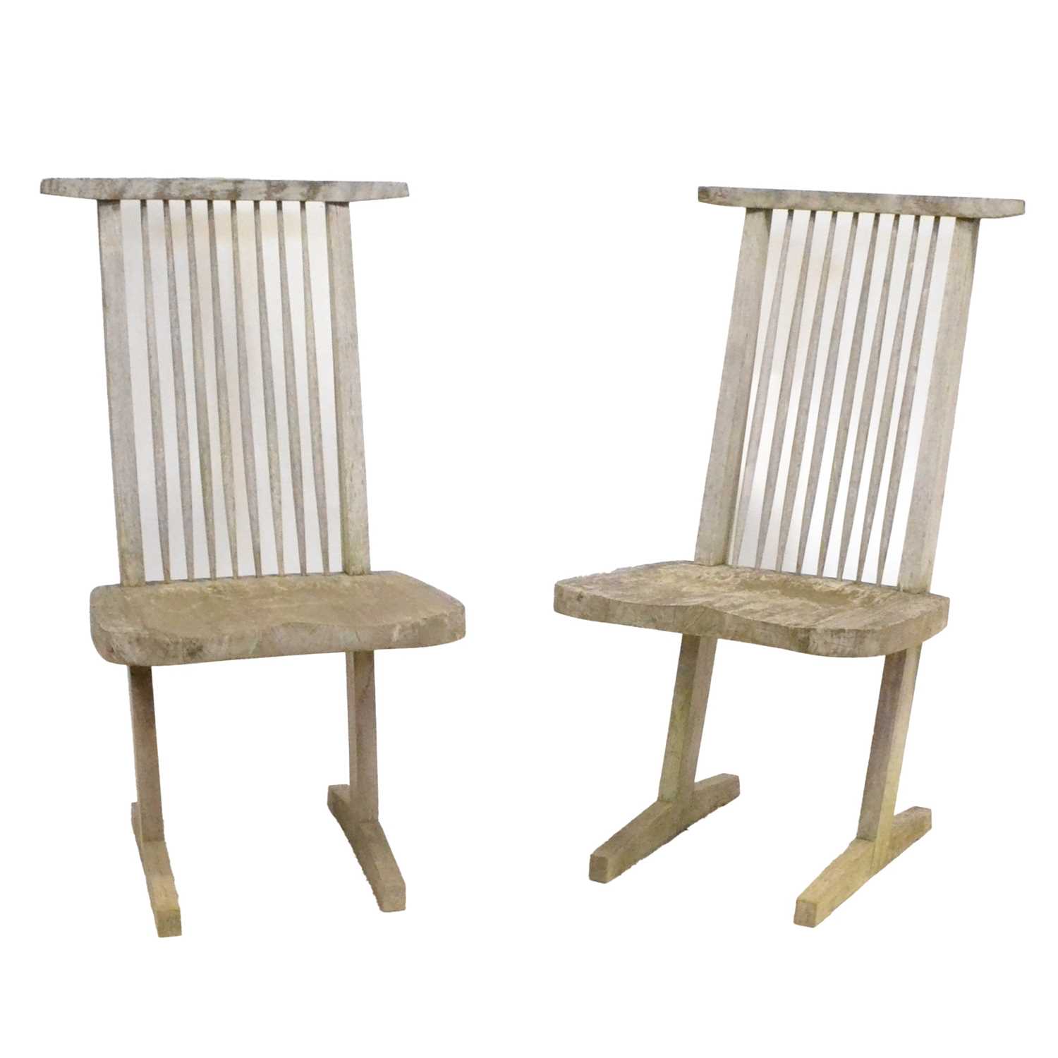 Lot 437 - Two teak garden chairs, in the style of George Nakashima's Conoid design