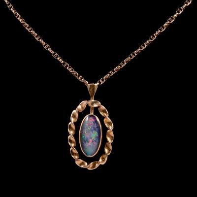 Lot 185 - An opal triplet pendant and carved shell cameo brooch.