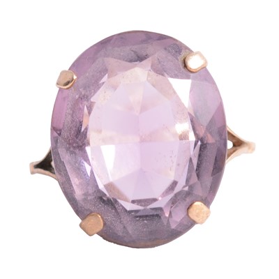 Lot 27 - An amethyst dress ring.