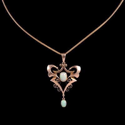 Lot 278 - An Edwardian opal pendant and chain.