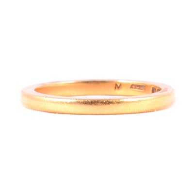 Lot 105 - A 22 carat gold wedding band.