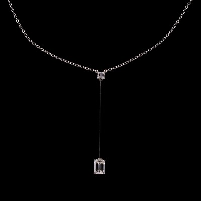 Lot 251 - A diamond pendant, one emerald cut diamond 2.2 carats and one Asscher cut diamond 0.40 carat.