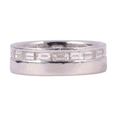 Lot 78 - A diamond set wedding/eternity ring.