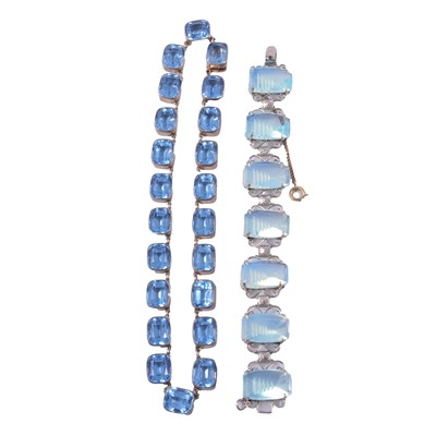 Lot 459 - An Art Deco blue paste riviere necklace and a bracelet with pagoda carvings.