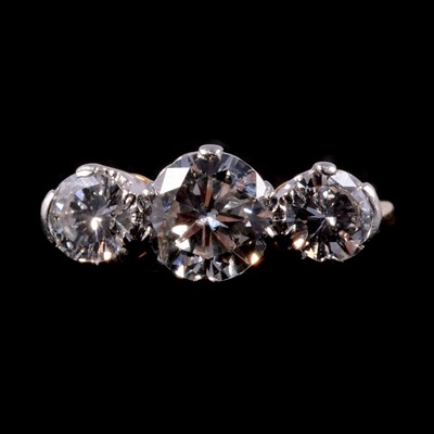 Lot 50 - A diamond three stone ring.