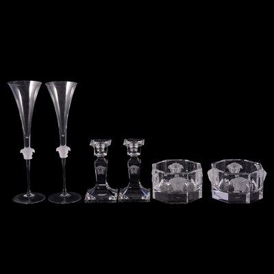 Lot 87 - Rosenthal for Versace - a pair of champagne/wine bottle coasters, candlesticks, champagne flutes.