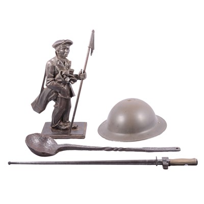 Lot 224 - Wooden hat block, helmet, bayonet, cast iron ladle and golfer fireside companion.