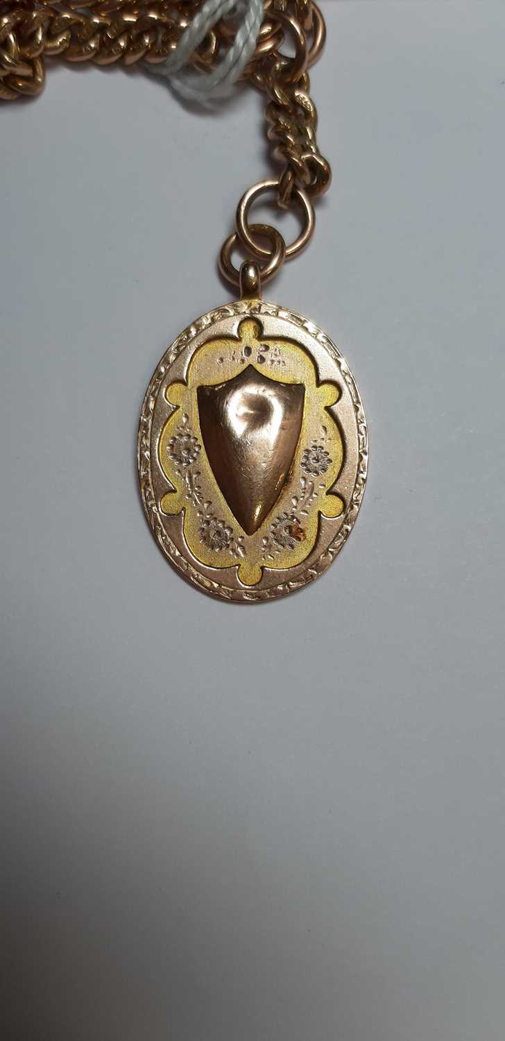 Lot 332 A 9 carat yellow gold double Albert watch