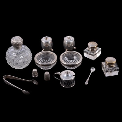 Lot 293 - Silver salts, pair of peppers, cologne bottle sugar tongs, thimbles, two glass inkwells.