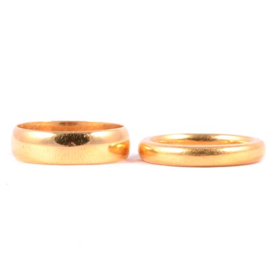 Lot 106 - Two 22 carat yellow gold wedding bands.