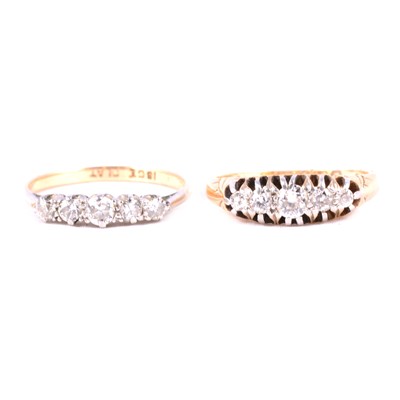 Lot 84 - Two diamond half hoop rings.