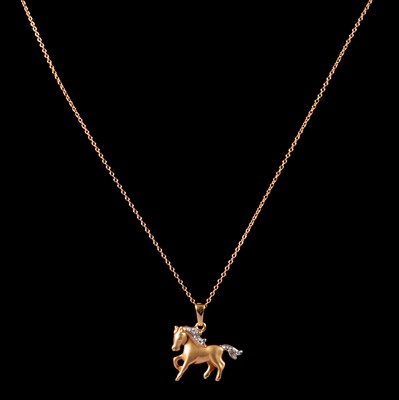 Lot 285 - A 9 carat gold horse pendant and chain, green stone pendant and chain.