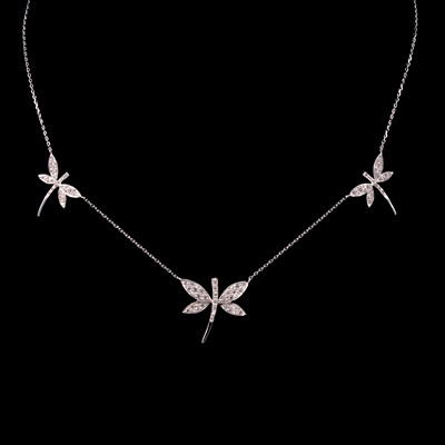 Lot 295 - A diamond set 18 carat white gold dragonfly necklace.