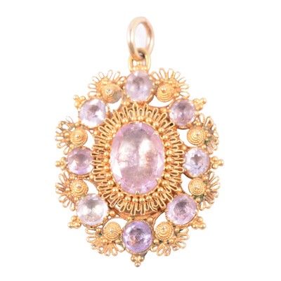 Lot 170 - An Etruscan style pale pink gemstone pendant.