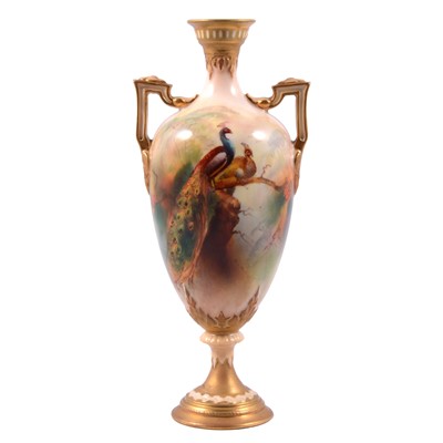 Lot 46 - J Flaxman for Royal Worcester, a twin handled vase painted with peacocks