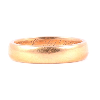 Lot 99 - A 22 carat gold wedding band.