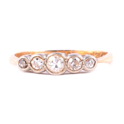 Lot 81 - A diamond five stone ring.