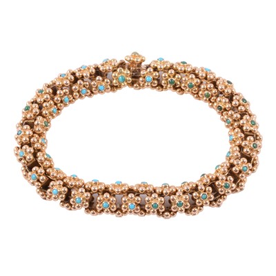 Lot 198 - An 18 carat yellow gold bracelet set with turquoise.