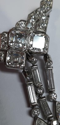 Lot 166 - Tiffany & Co. - a signed diamond set brooch.