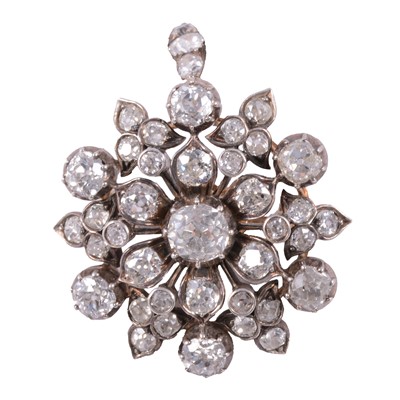 Lot 165 - A Victorian diamond set brooch pendant.