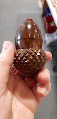 Lot 144 - Carved coquilla nut acorn-shape nutmeg grater, and other treen and parlour games