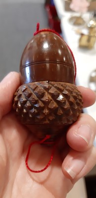 Lot 144 - Carved coquilla nut acorn-shape nutmeg grater, and other treen and parlour games