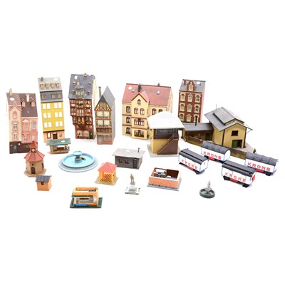 Lot 305 - Eight OO/HO gauge trackside buildings, with a selection of smaller kiosks and fountains