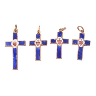 Lot 451 - A collection of enamel and gilt metal crosses.