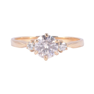 Lot 70 - A synthetic diamond three stone ring