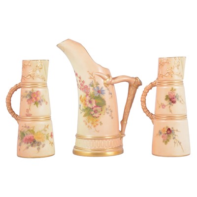 Lot 84 - A pair of Royal Worcester blush jugs and another jug