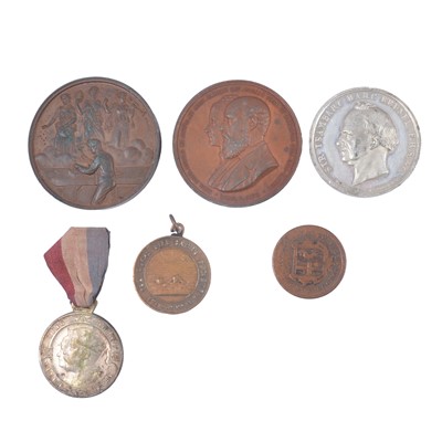 Lot 211 - Five 19th century and later commemorative medals and a railway token.