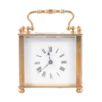 Lot 136 - Small brass carriage clock timepiece.