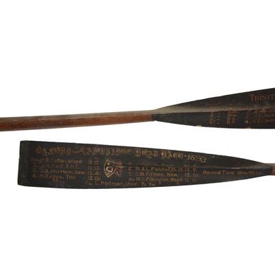 Lot 436 - Trinity College/ Rowing interest: two oars from 1893, and a cabinet
