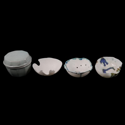 Lot 150 - Suite of three porcelain freeform dishes, and a celadon covered jar