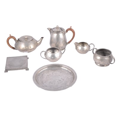 Lot 128 - Arts & Crafts beaten pewter tray, pewter teaset, etc.