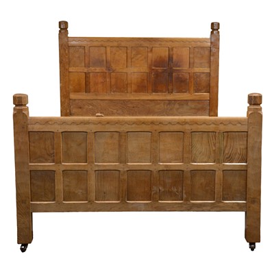 Lot 84 - Robert 'Mouseman' Thompson of Kilburn, an oak panelled double bed, dated 1941