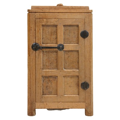 Lot 85 - Robert 'Mouseman' Thompson of Kilburn, an oak panelled bedside cupboard, 1941