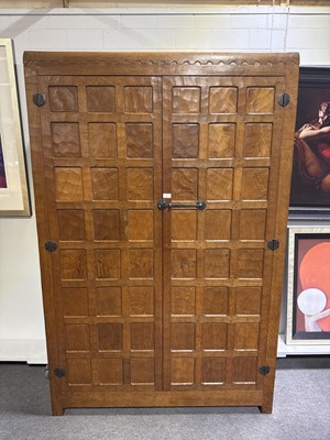 Lot 86 - Robert 'Mouseman' Thompson of Kilburn, an oak double wardrobe, 1941