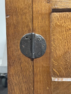 Lot 86 - Robert 'Mouseman' Thompson of Kilburn, an oak double wardrobe, 1941