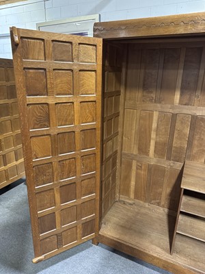 Lot 86 - Robert 'Mouseman' Thompson of Kilburn, an oak double wardrobe, 1941