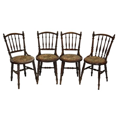 Lot 452 - Set of four walnut railed back chairs