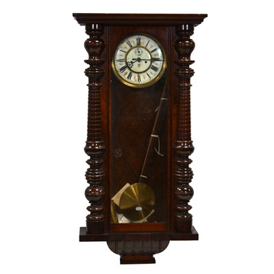 Lot 353 - Walnut Vienna type wall clock