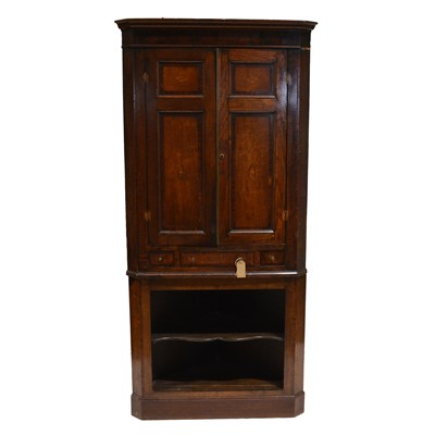 Lot 386 - Georgian oak freestanding corner cupboard