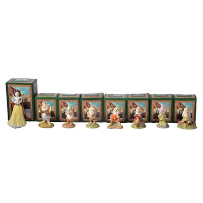 Lot 39 - Royal Doulton Snow White and the Seven Dwarves.