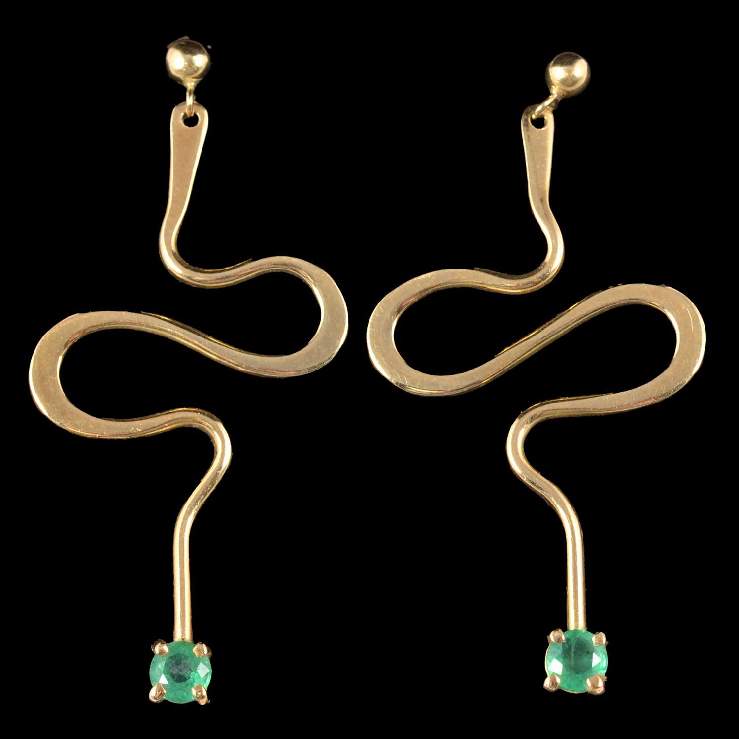 Lot 115 - Cathy Stephens - a pair of 18 carat yellow gold and emerald earrings.